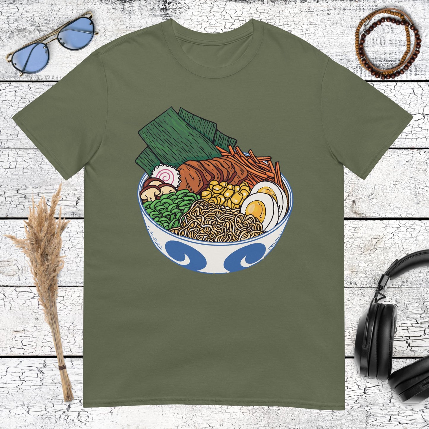 Kawaii aesthetic ramen noodle bowl graphic printed on a military green t-shirt