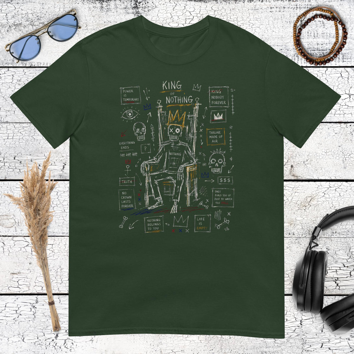 Bold crowned king illustration with contemporary street art details on a forest green t-shirt