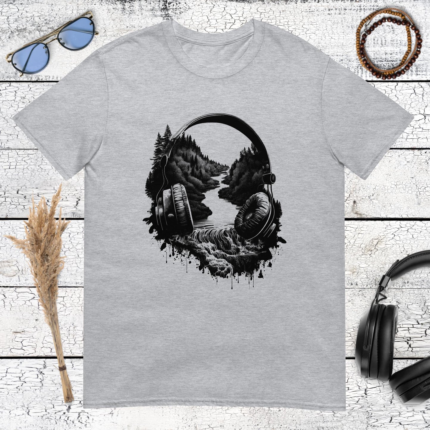 Sketch style mountain and river landscape inside a headphones silhouette on a sport grey t-shirt