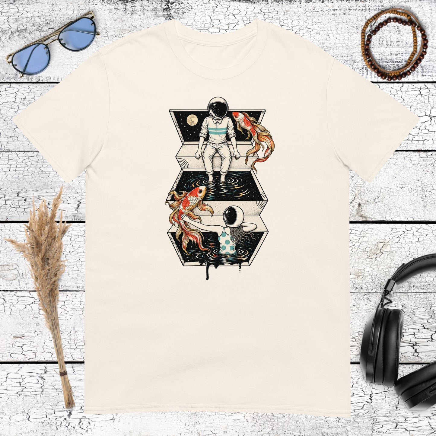 Astronaut, koi fish and cosmic collage artwork printed on a natural cotton t-shirt