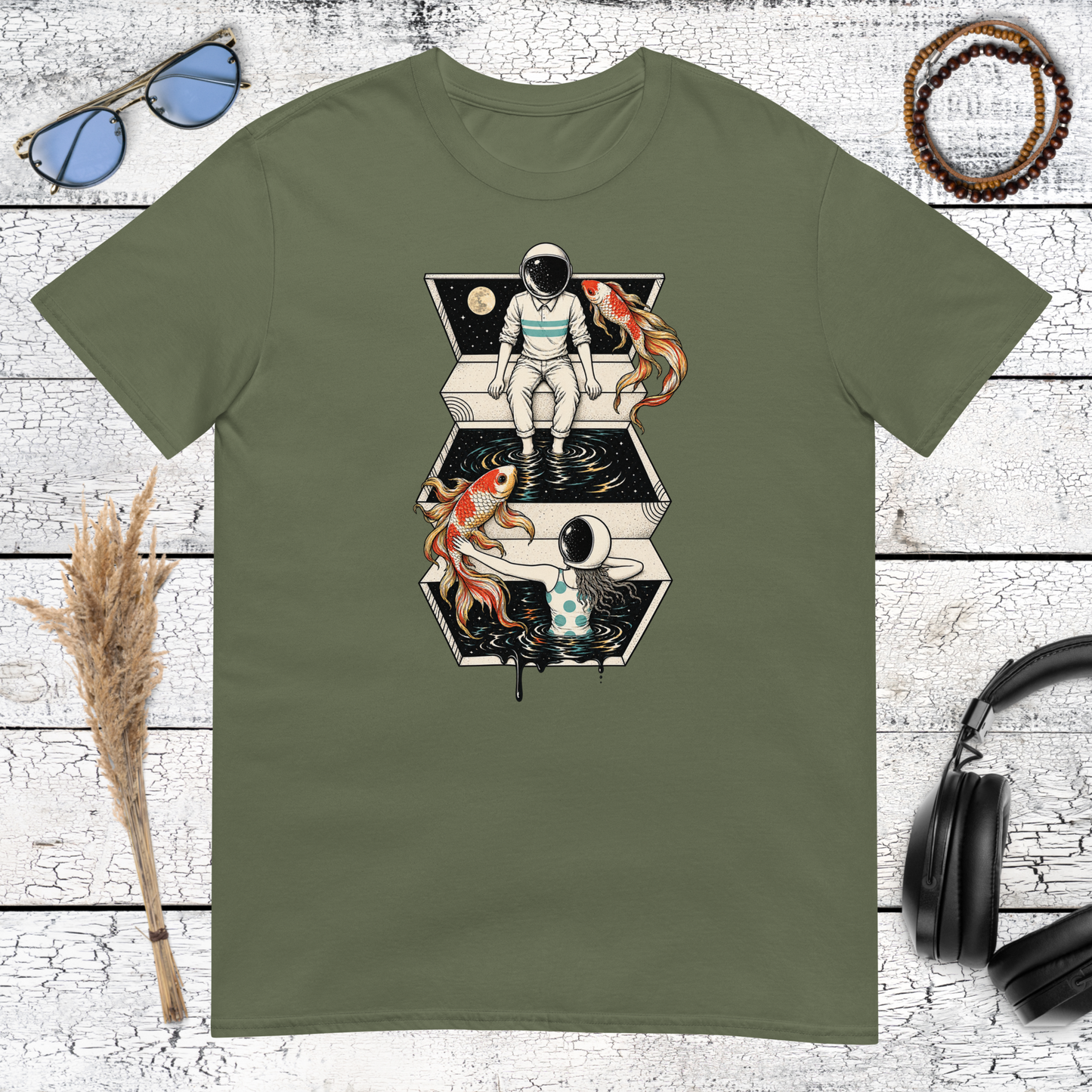 Surreal astronaut with koi fish and cosmic collage details on a military green t-shirt