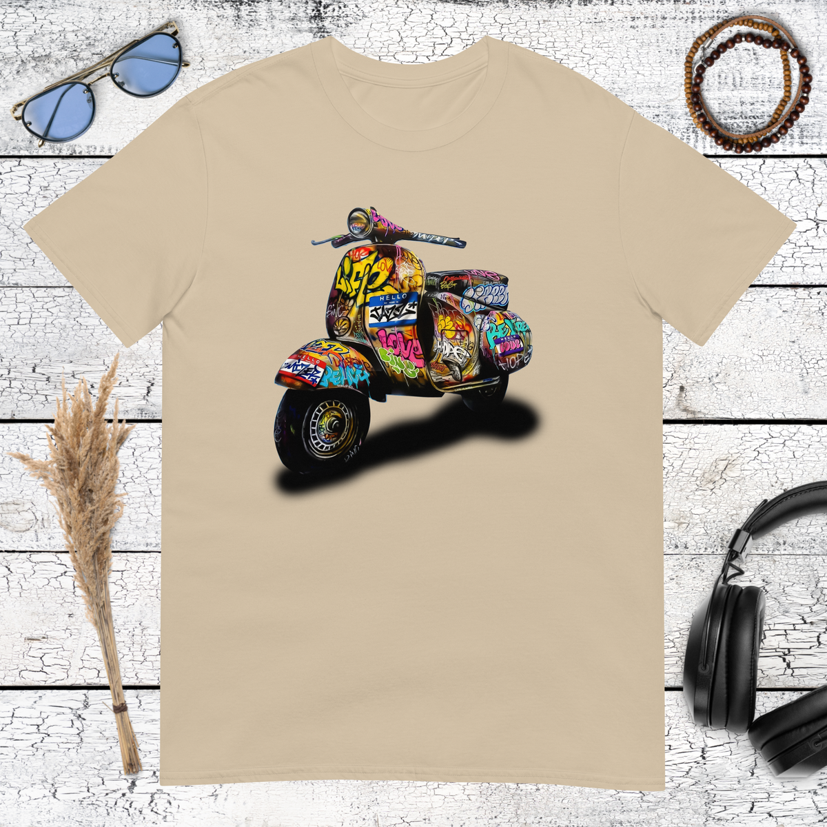Colourful Vespa scooter graphic with graffiti details printed on a sand t-shirt