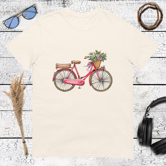 Retro pink bicycle illustration with a basket full of colorful flowers on a natural cotton t-shirt