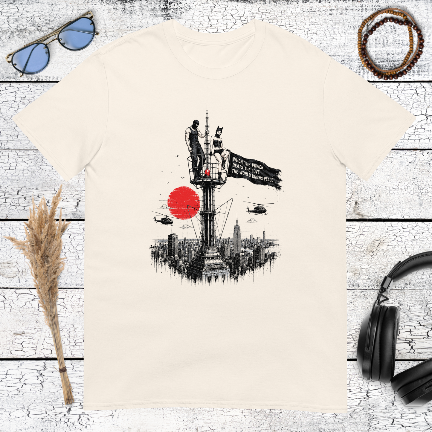 Minimalist city skyline with giant cat and red sun art on natural shirt