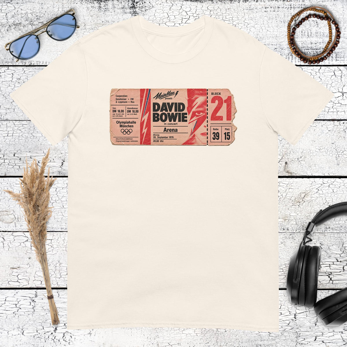 Nostalgic red and cream poster-style graphic printed on a natural cotton t-shirt