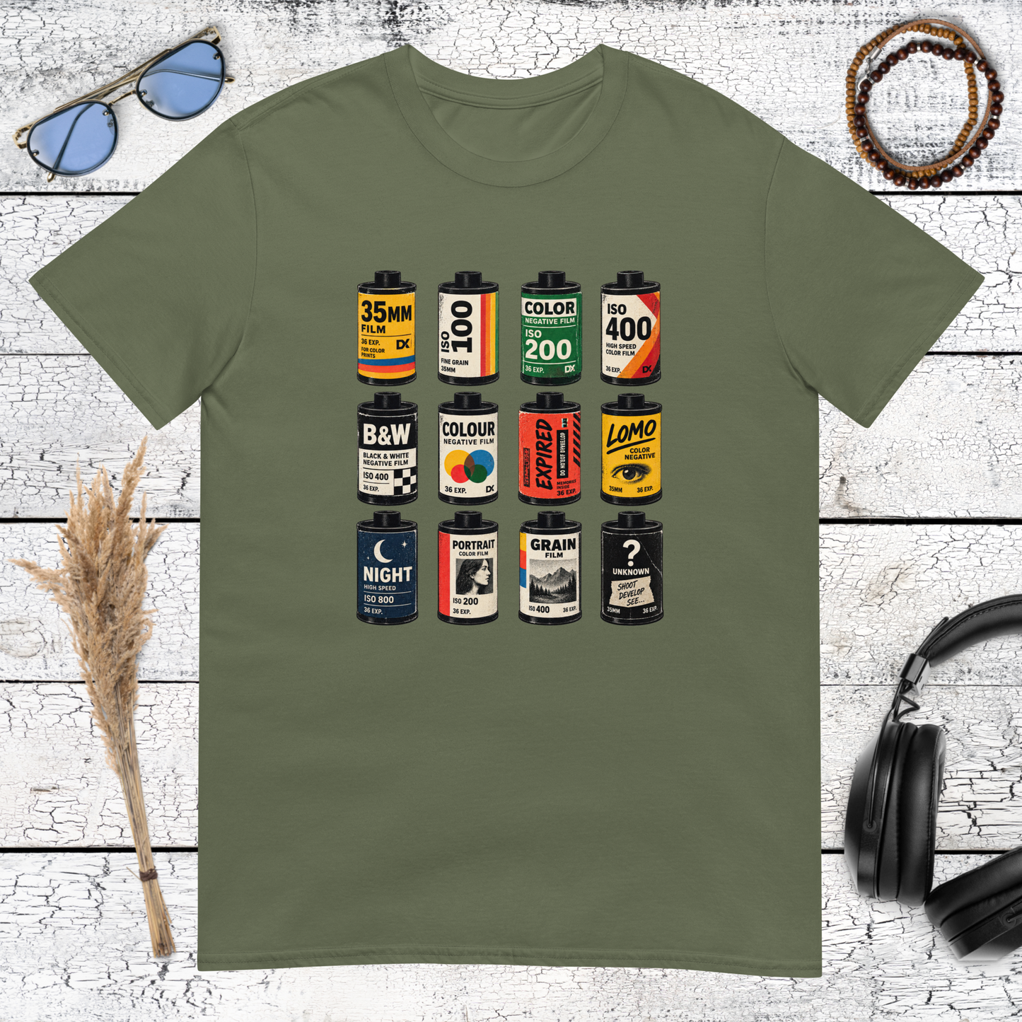 Colourful film roll and analogue photography graphic printed on a military green t-shirt