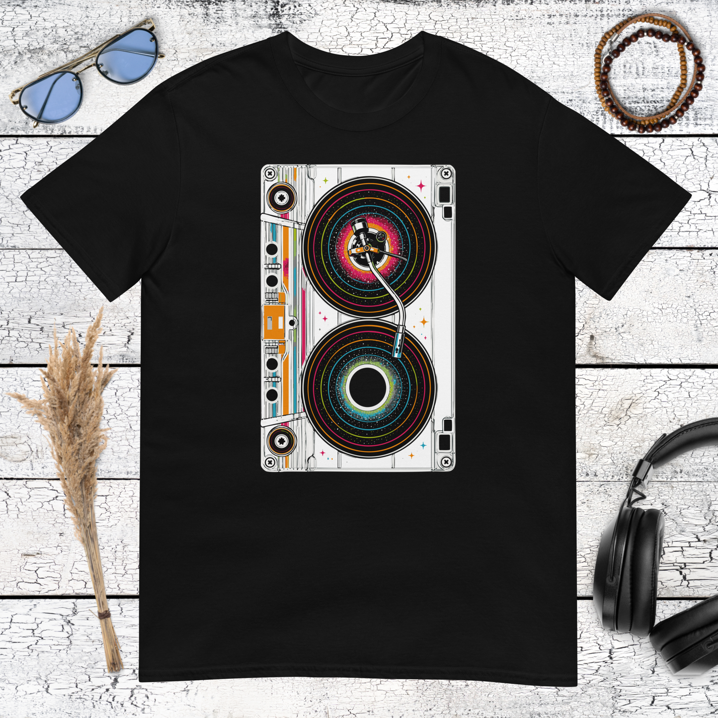 Retro stereo speaker graphic with colourful details printed on a black t-shirt
