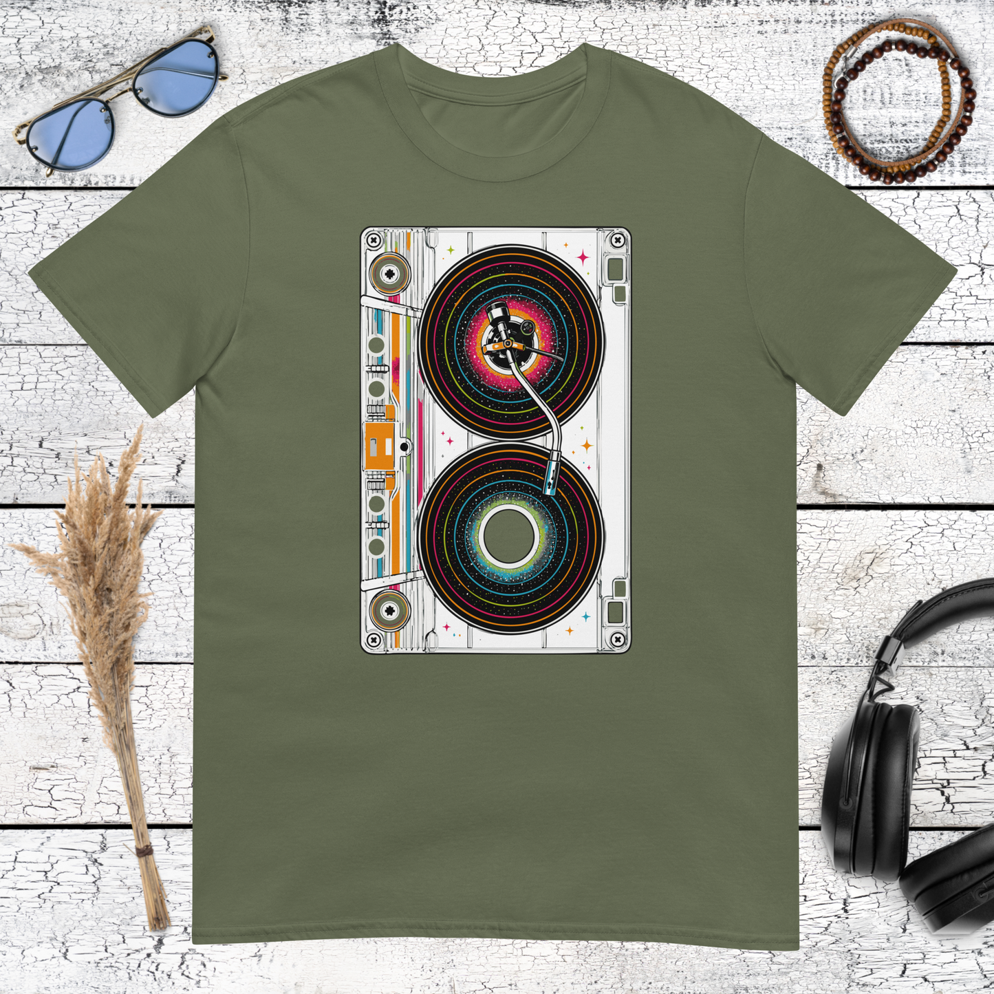Retro speaker artwork with red and white details on a military green t-shirt