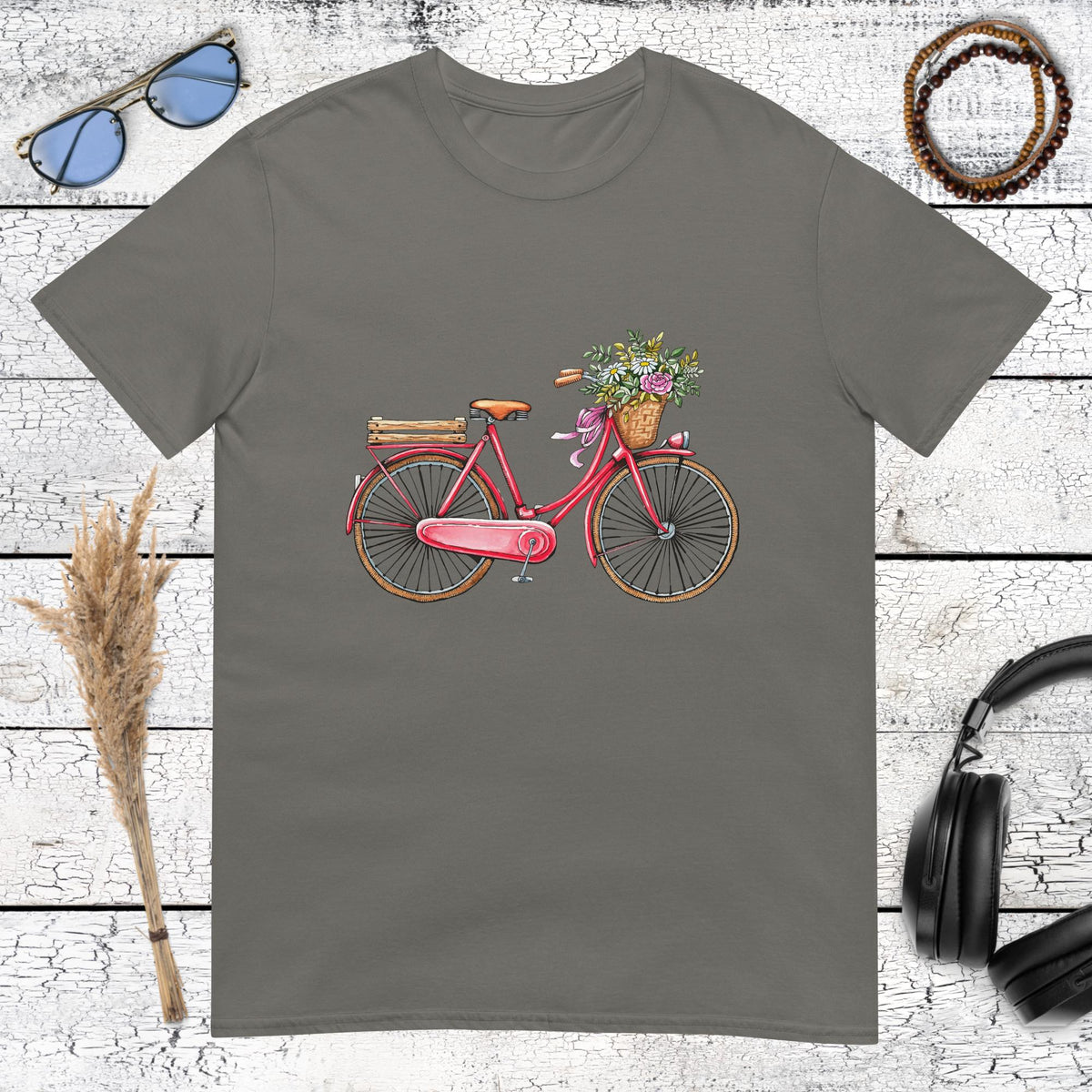 Retro pink bike art with floral basket on a charcoal t-shirt