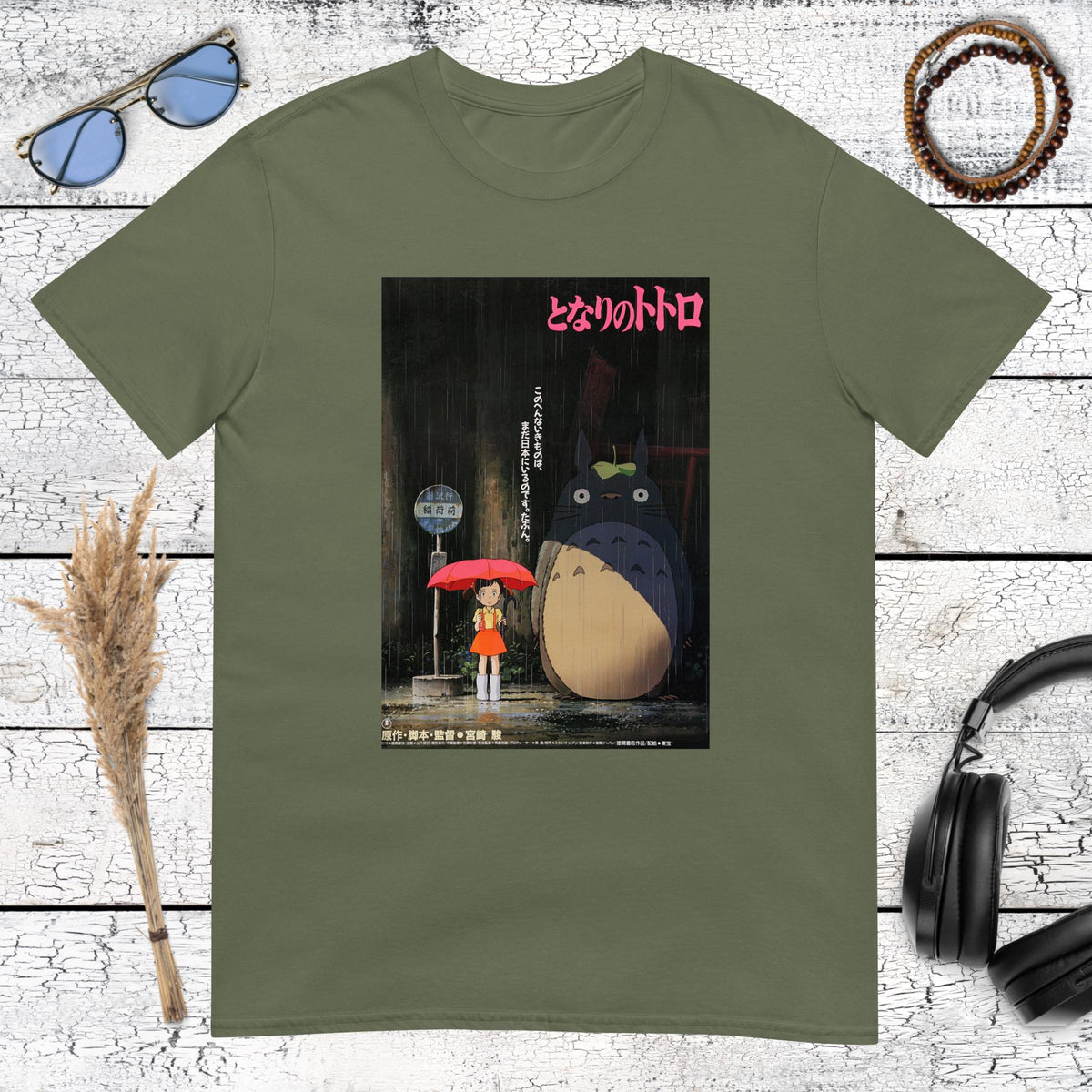 Nostalgic Totoro anime poster graphic printed on a military green t-shirt