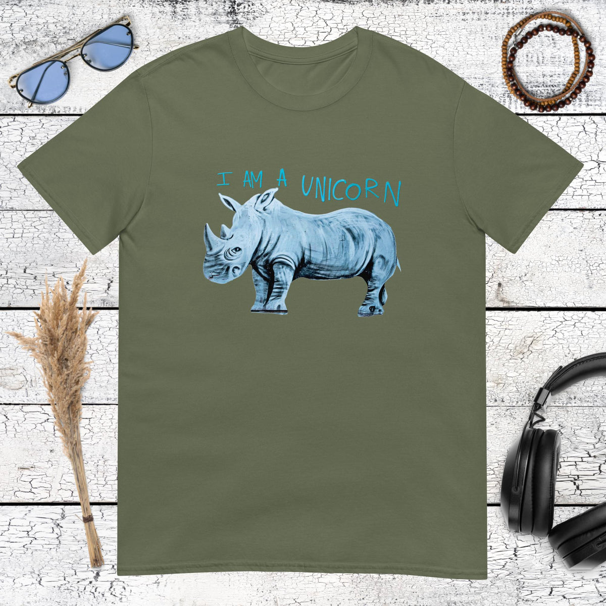 Whimsical wildlife illustration featuring a rhinoceros as a unicorn on a military green t-shirt