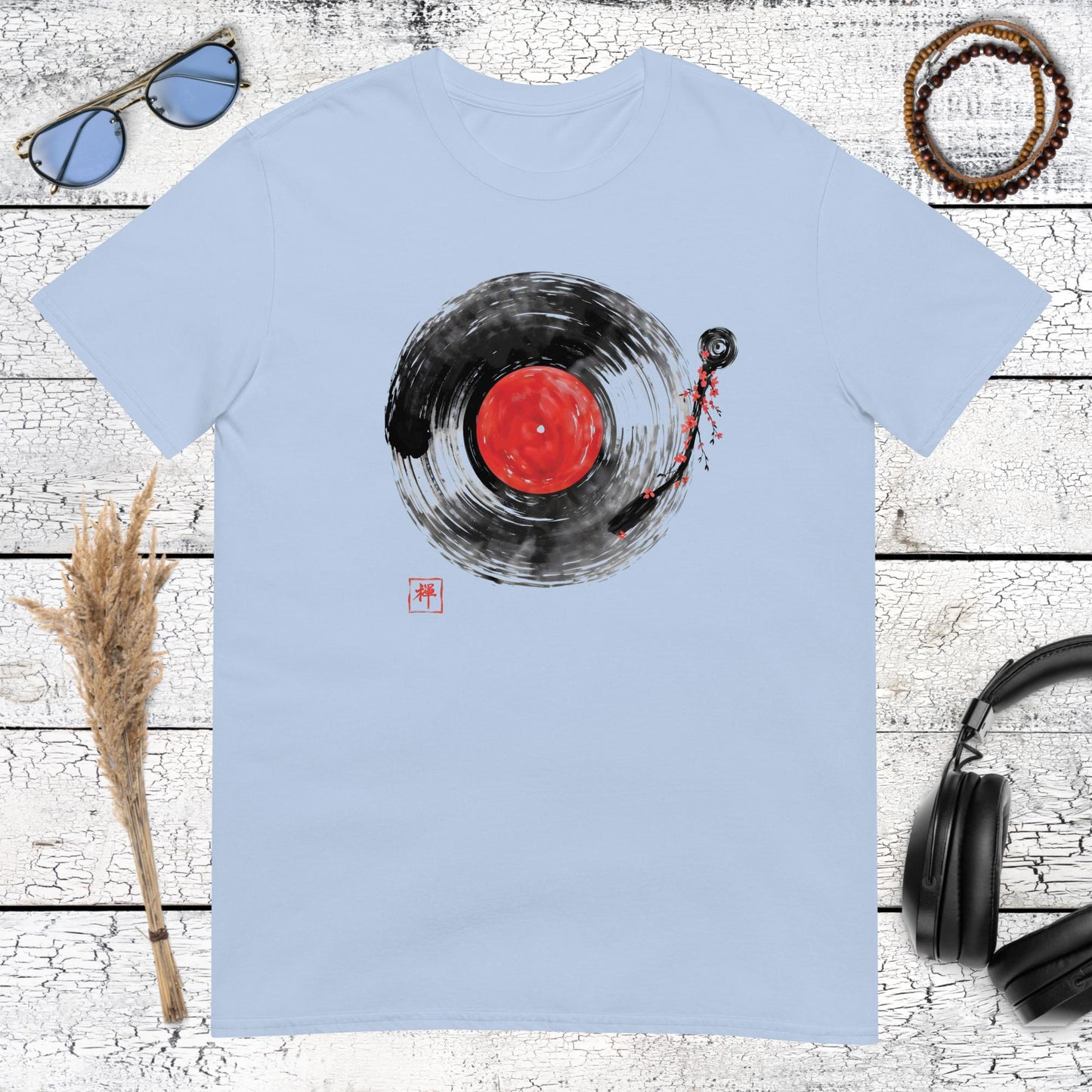 Sumi-e style record player vinyl graphic on a light blue cotton shirt