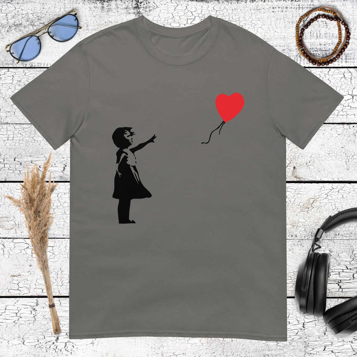 Dark charcoal t-shirt featuring the famous Banksy red heart balloon girl