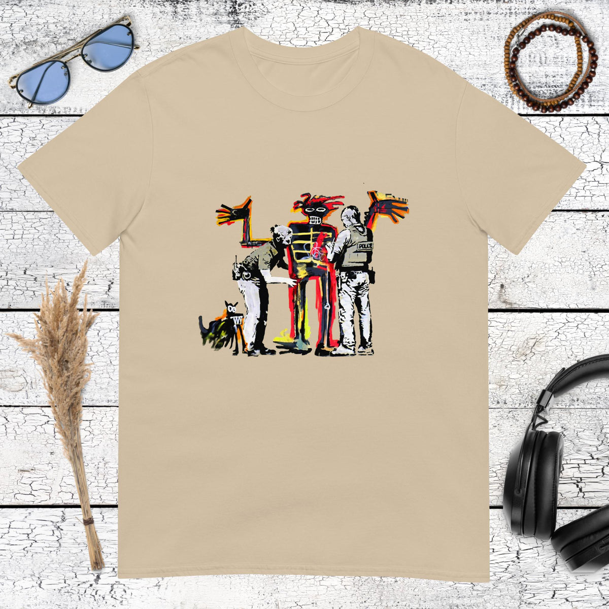 Sand colored t-shirt featuring a Basquiat-style expressionist painting