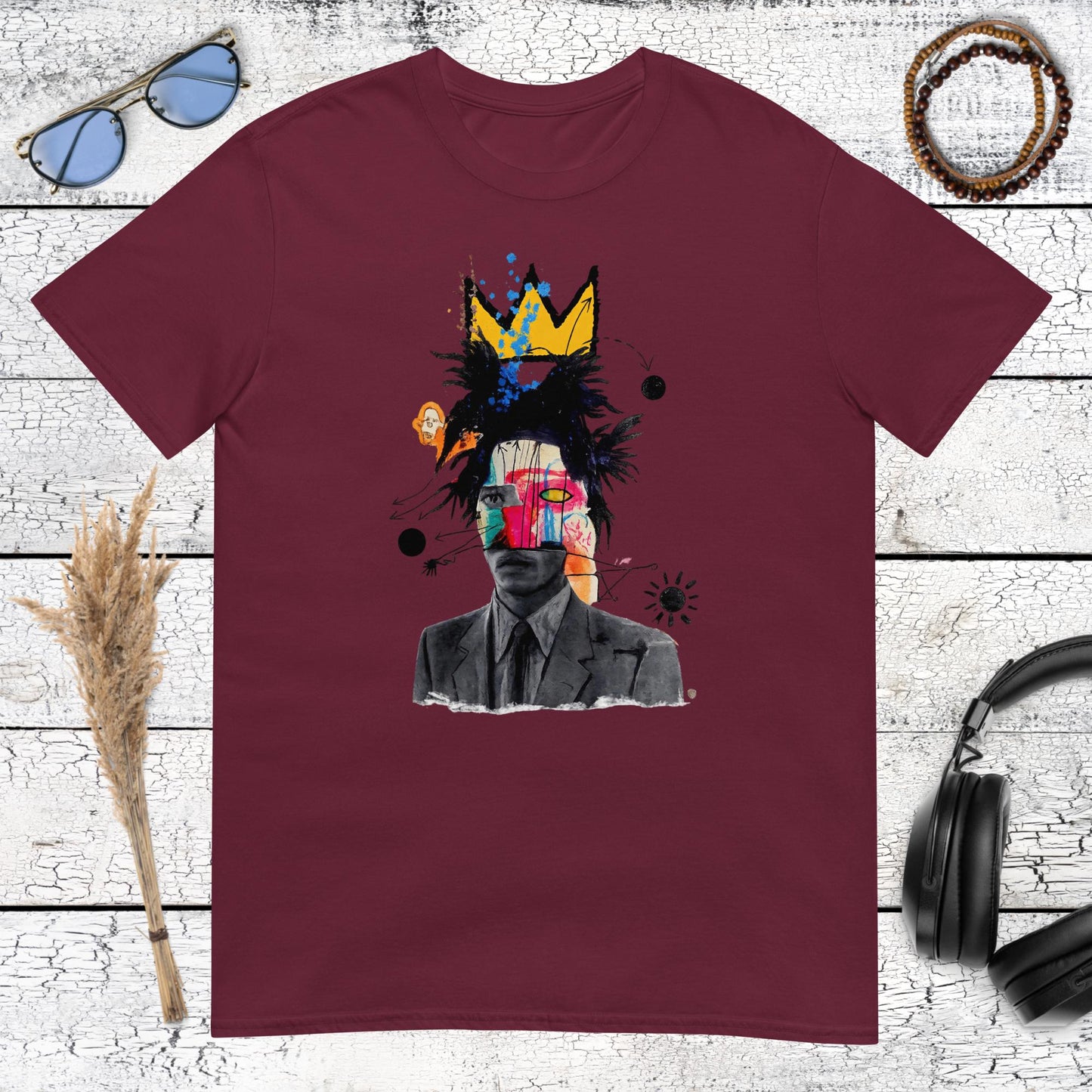 Maroon t-shirt featuring a crowned urban art portrait graphic