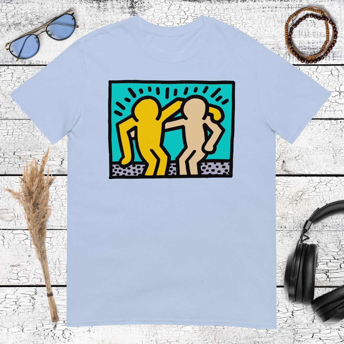 Light blue t-shirt with a colorful Keith Haring inspired pop art design