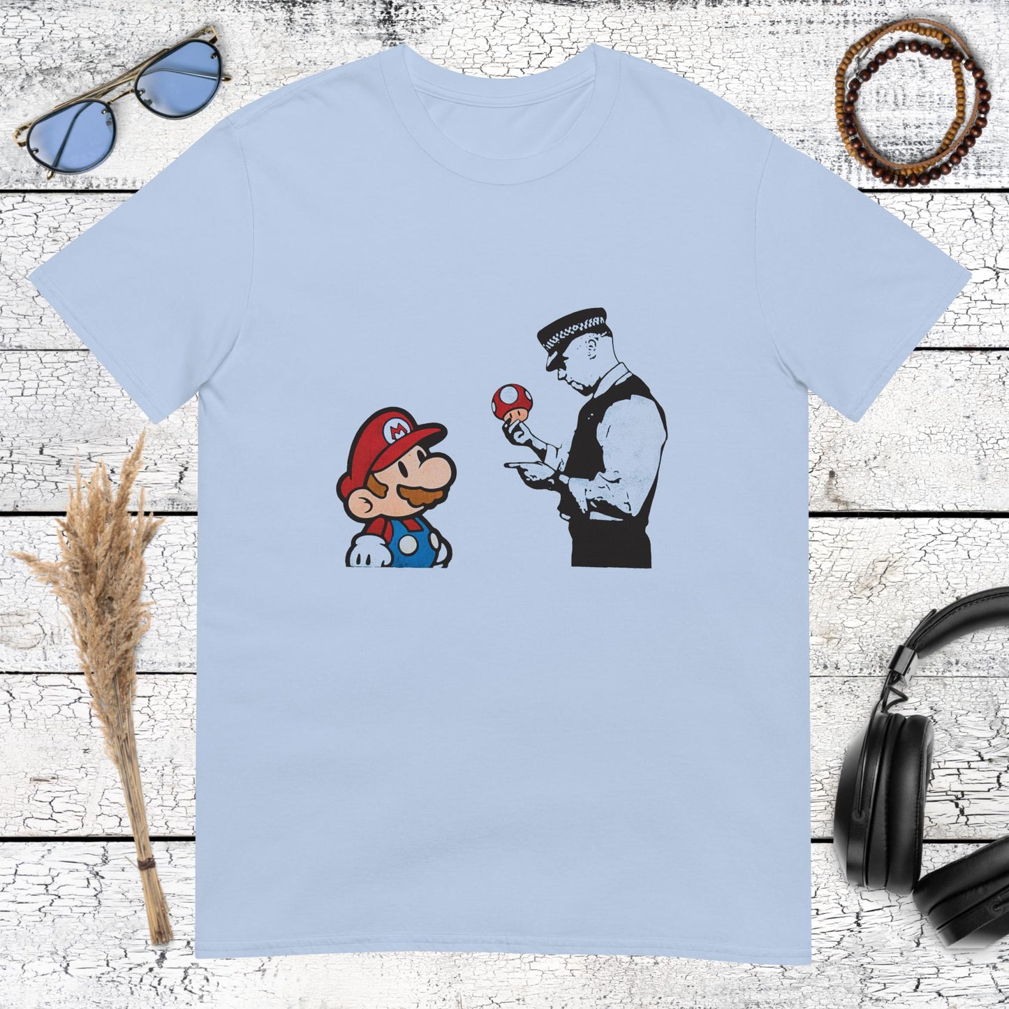 Stencil art style Mario vs police illustration printed on a light blue t-shirt