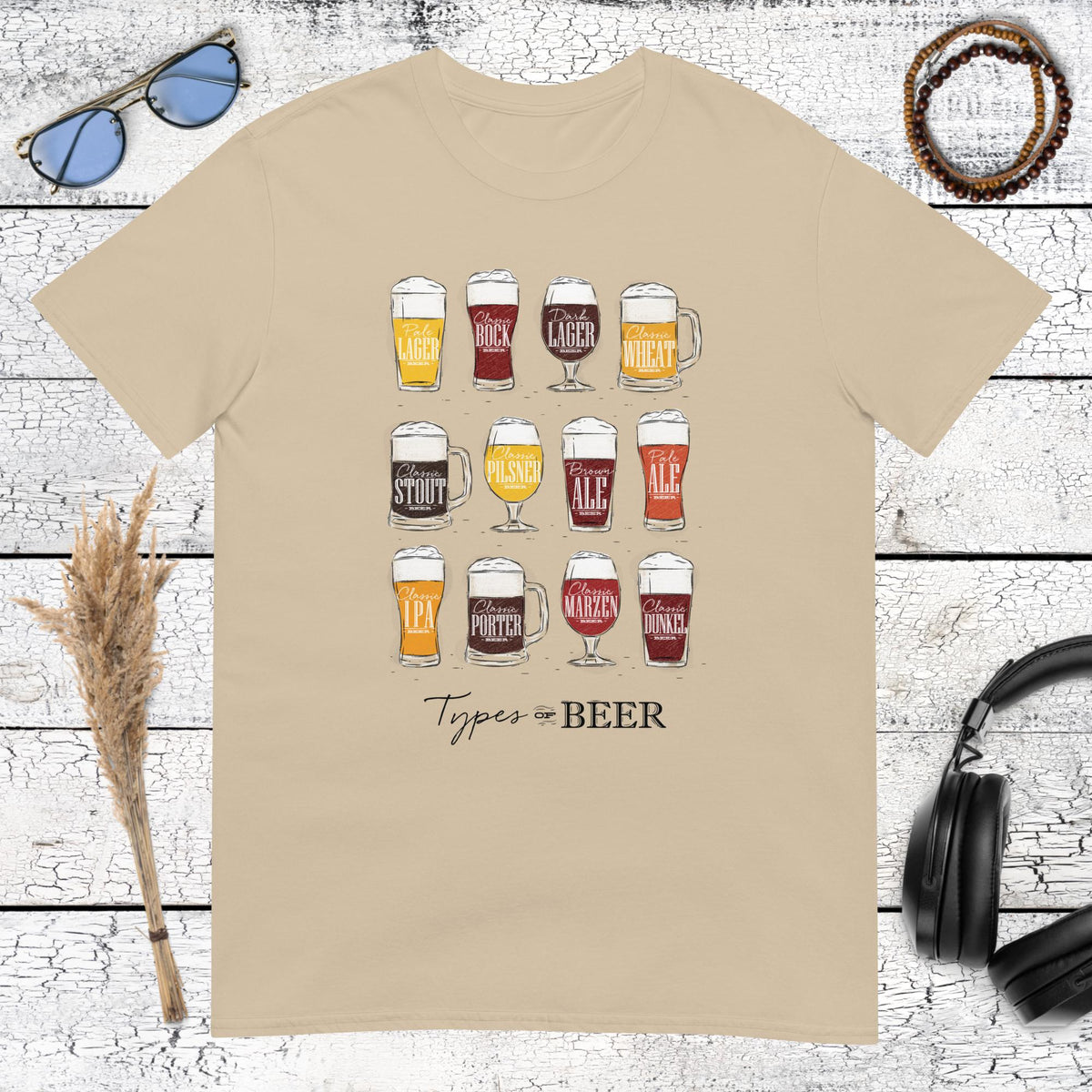 Aesthetic beer variety graphic featuring 12 different pints on a sand coloured t-shirt