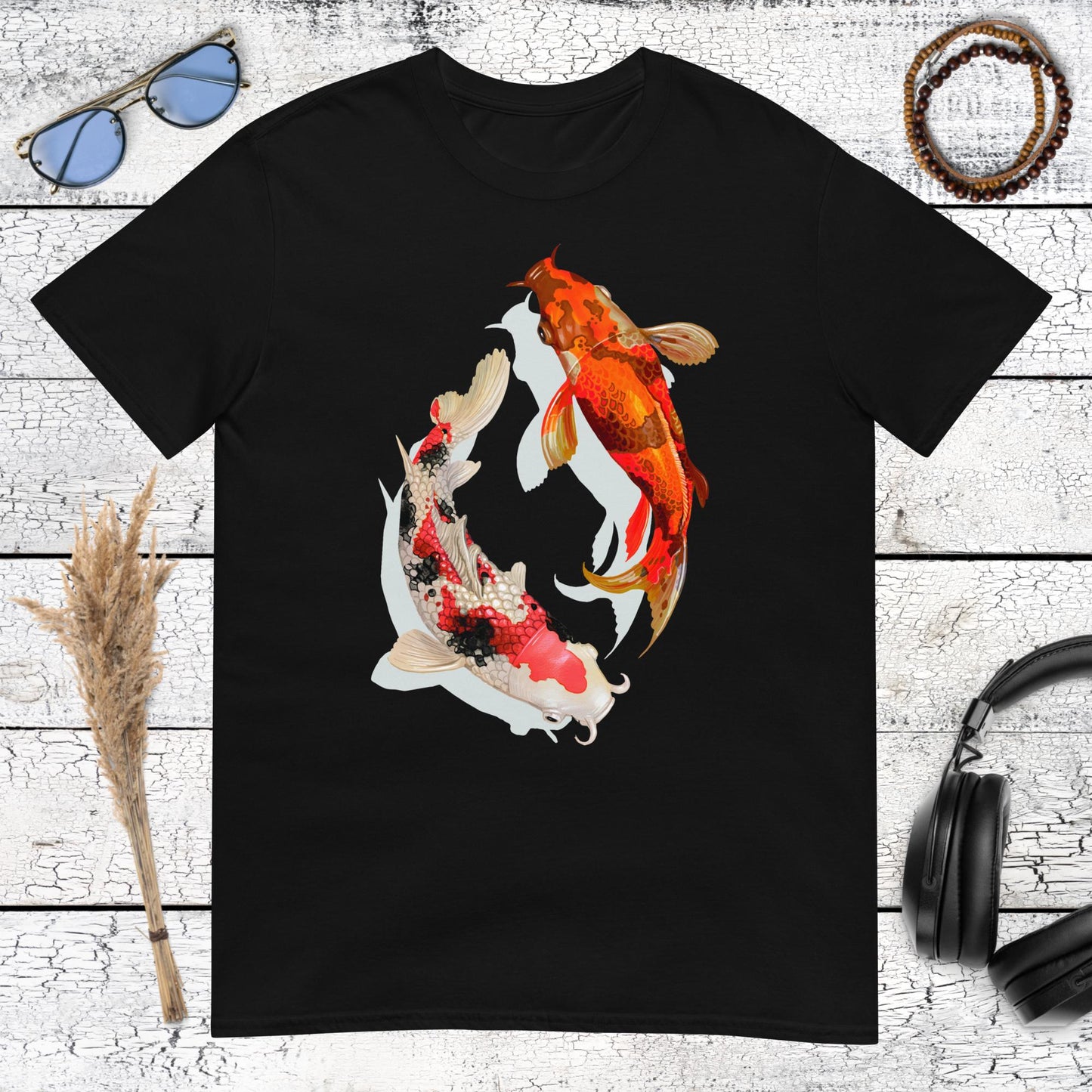 Black t-shirt featuring orange and white Koi fish in a Yin Yang circle